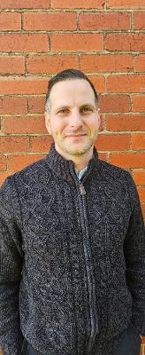 An image of Onur who offers client support for psychologists in melbourne.